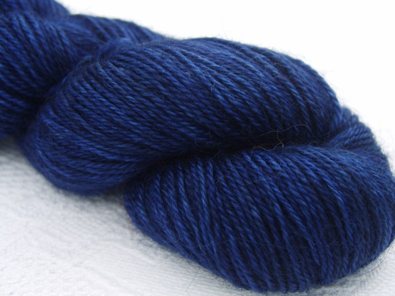 HDark, warm blue (with a violet hint) hand-dyed Wensleydale DK/ Double Knit yarn. Hand-dyed by Triskelion Yarn