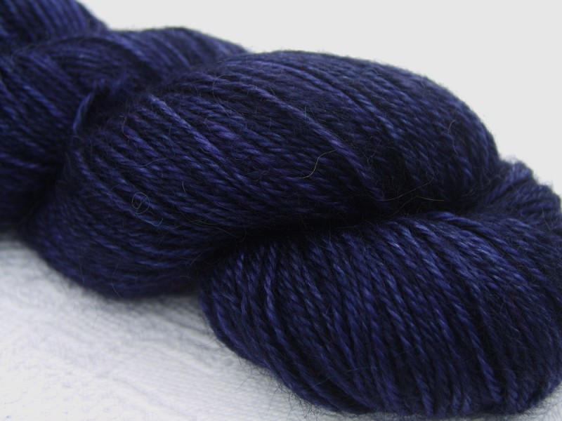 Dark, rich violet hand-dyed Wensleydale DK/ Double Knit yarn. Hand-dyed by Triskelion Yarn