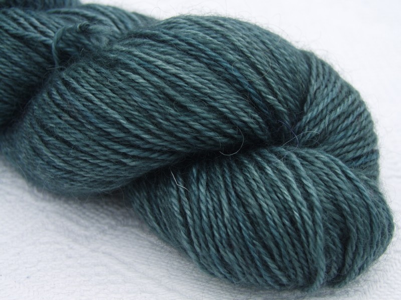 Mid to dark sea grey (hints of greens and blues) hand-dyed Wensleydale DK/ Double Knit yarn. Hand-dyed by Triskelion Yarn