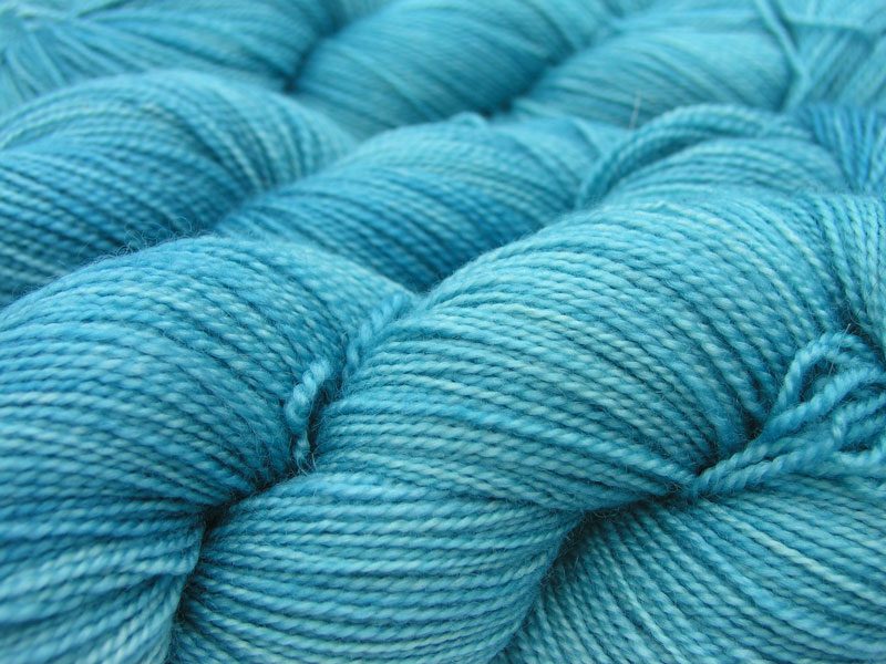 Semi-solid sky blue superwash Bluefaced Leicester (BFL) 4-ply/fingering/sock yarn. Hand-dyed by Triskelion Yarn