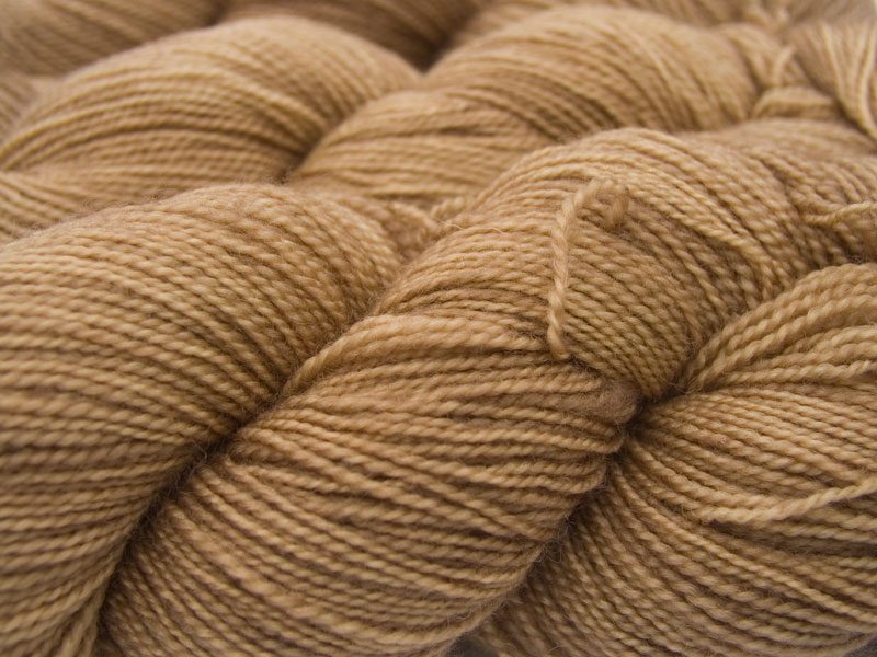 Light to mid brown superwash Bluefaced Leicester (BFL) 4-ply/fingering/sock yarn. Hand-dyed by Triskelion Yarn