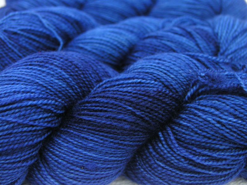 Semi-solid deep blue superwash Bluefaced Leicester (BFL) 4-ply/fingering/sock yarn. Hand-dyed by Triskelion Yarn