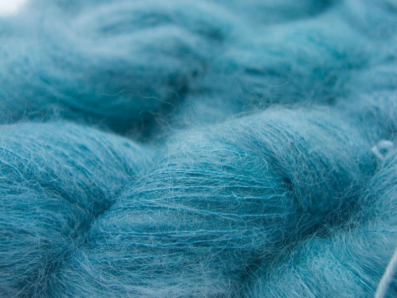 Clear sky blue kidsilk laceweight yarn. Hand-dyed by Triskelion Yarn