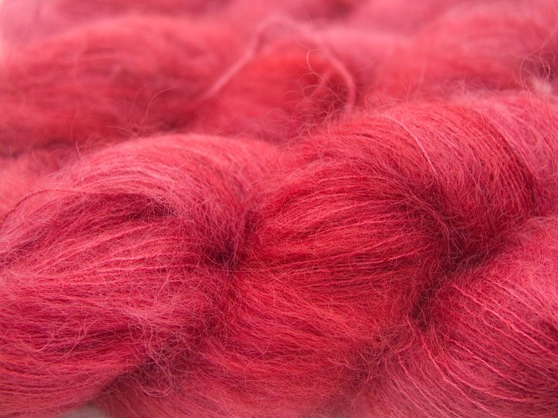 Rich rose kidsilk laceweight yarn. Hand-dyed by Triskelion Yarn