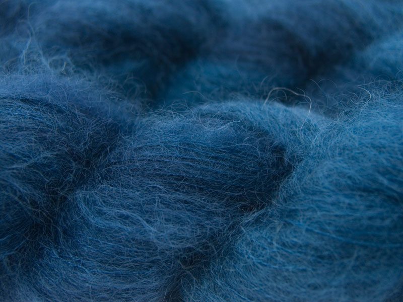 Smoky dark blue kidsilk laceweight yarn. Hand-dyed by Triskelion Yarn