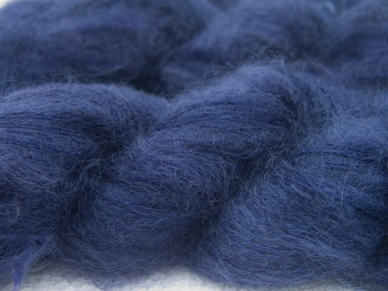 Smoky violet-purple kidsilk laceweight yarn. Hand-dyed by Triskelion Yarn