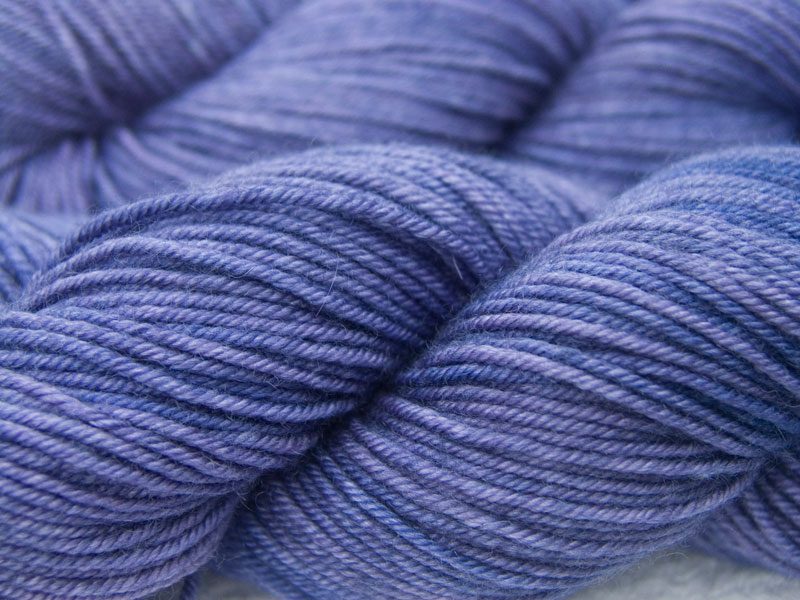 Mid-tone purple Bluefaced Leicester, silk & cashmere double knit yarn. Hand-dyed by Triskelion Yarn.