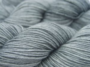 Mid-tone steely blue-grey Bluefaced Leicester, silk & cashmere double knit yarn. Hand-dyed by Triskelion Yarn.
