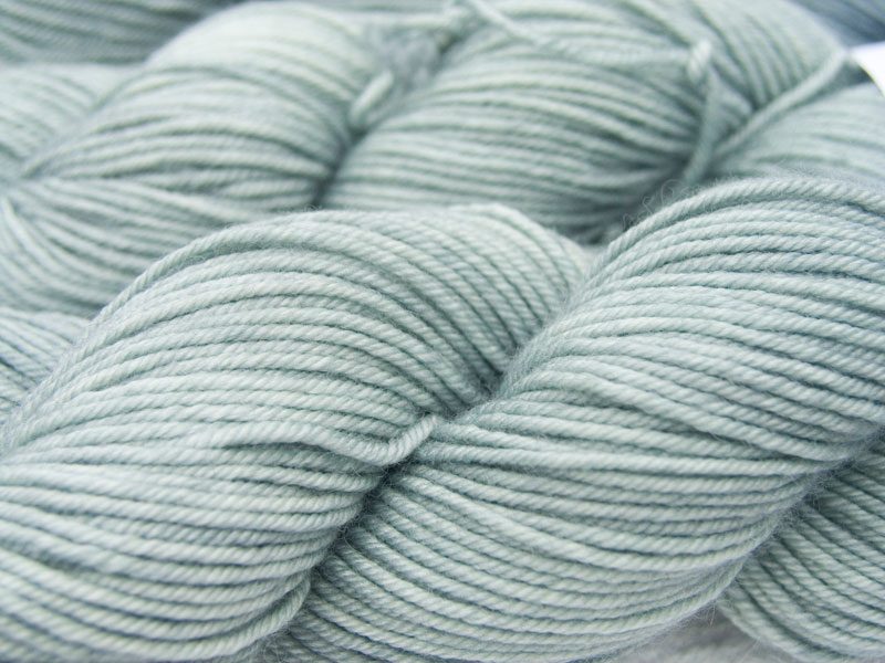 Pale blue-grey Bluefaced Leicester, silk & cashmere double knit yarn. Hand-dyed by Triskelion Yarn.