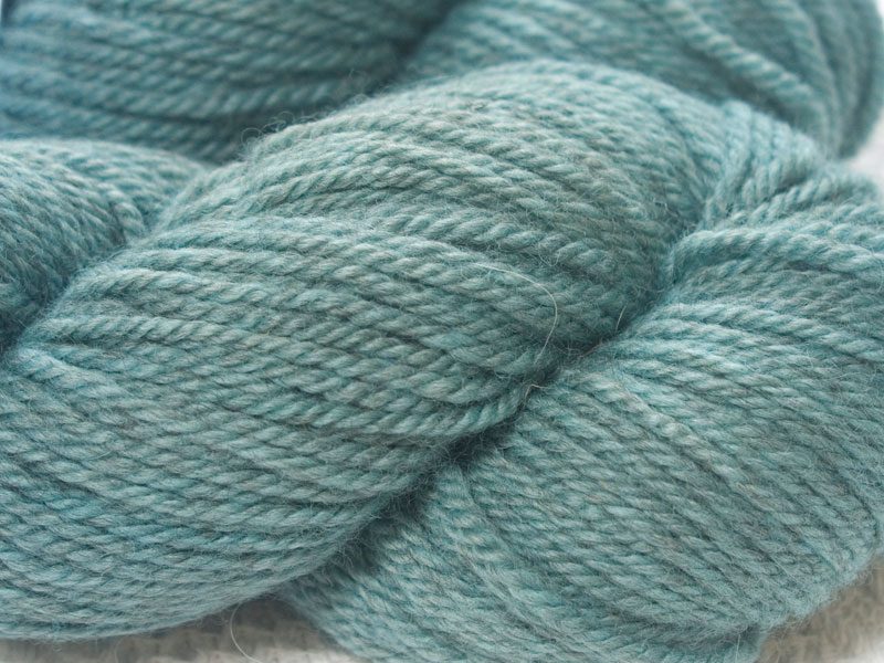 Semi-solid sky blue Bluefaced Leicester (BFL) / Masham aran yarn. Hand-dyed by Triskelion Yarn