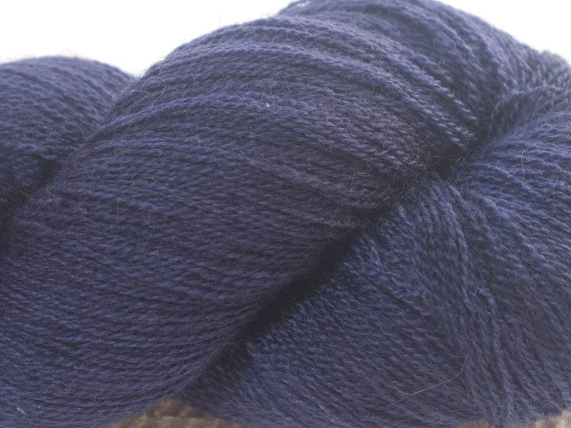 Semi-solid deep purple and blue-violet Bluefaced Leicester laceweight yarn hand-dyed by Triskelion Yarns