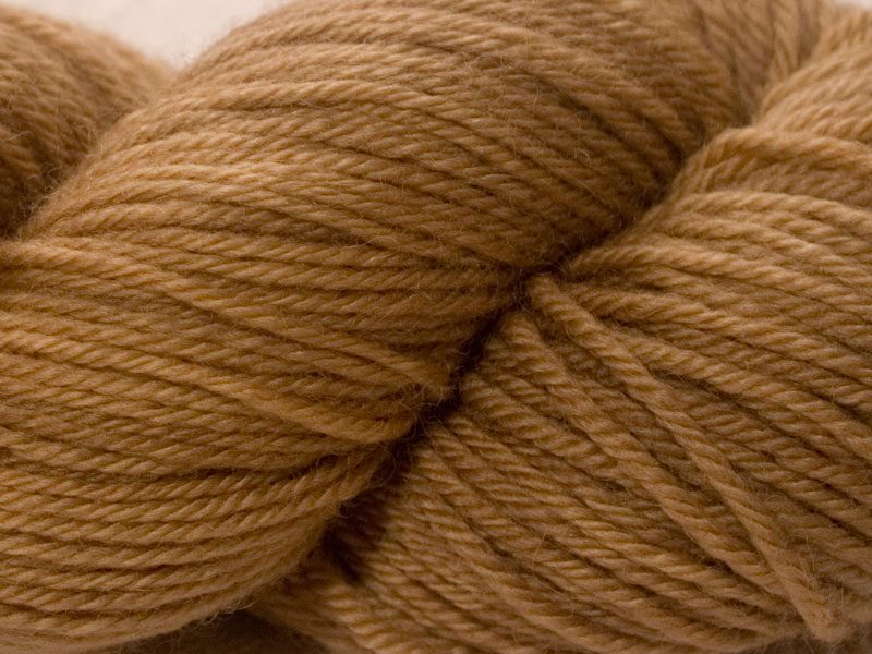 Light brown superwash British Bluefaced Leicester sportweight yarn. hand-dyed by Triskelion Yarn
