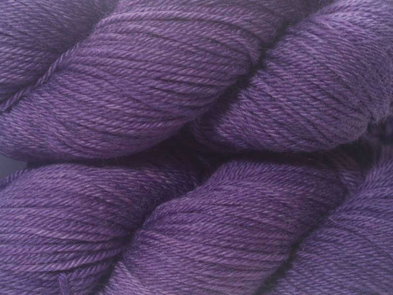 Purple superwash British Bluefaced Leicester sportweight yarn. hand-dyed by Triskelion Yarn