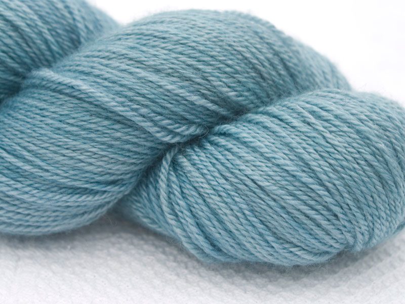 Light blue Bluefaced Leicester, silk & cashmere 4-ply yarn. Hand-dyed by Triskelion Yarn.
