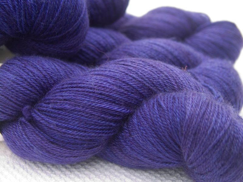 Deep purple Bluefaced Leicester, silk & cashmere 4-ply yarn. Hand-dyed by Triskelion Yarn.