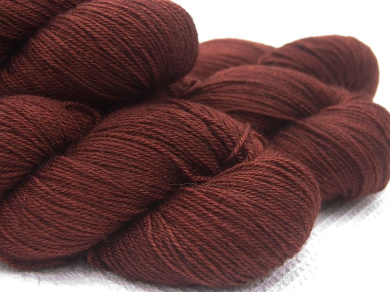 Chestnut brown Bluefaced Leicester, silk & cashmere 4-ply yarn. Hand-dyed by Triskelion Yarn.
