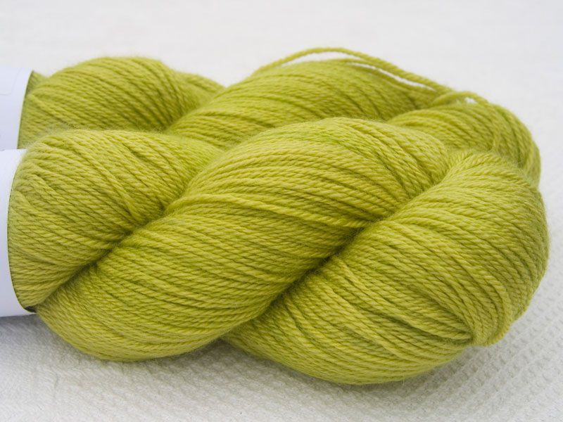 Chartreuse Green Bluefaced Leicester, silk & cashmere 4-ply yarn. Hand-dyed by Triskelion Yarn.