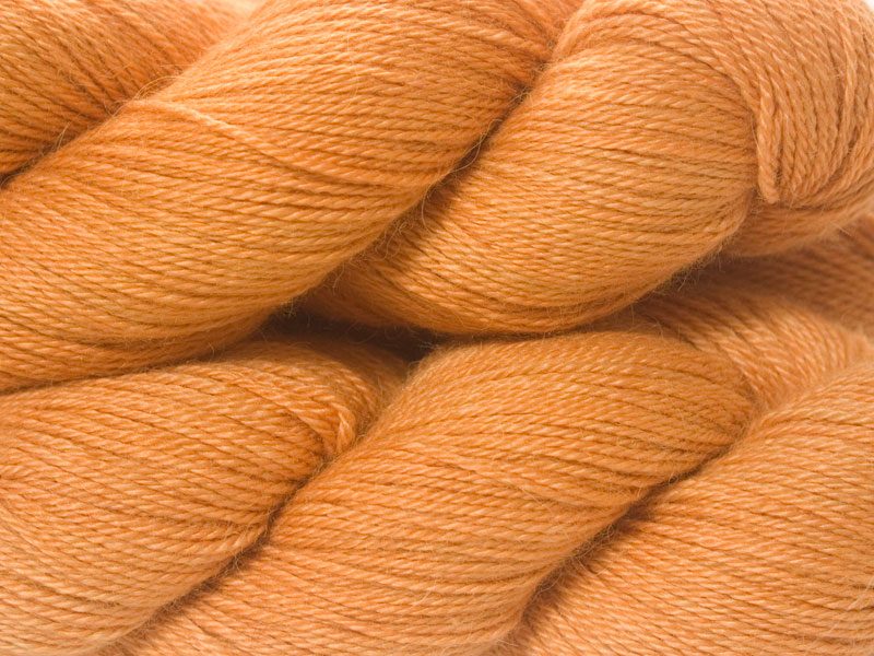 Orange Baby Alpaca Silk & Cashmere 4-ply yarn. Hand-dyed by Triskelion Yarn.