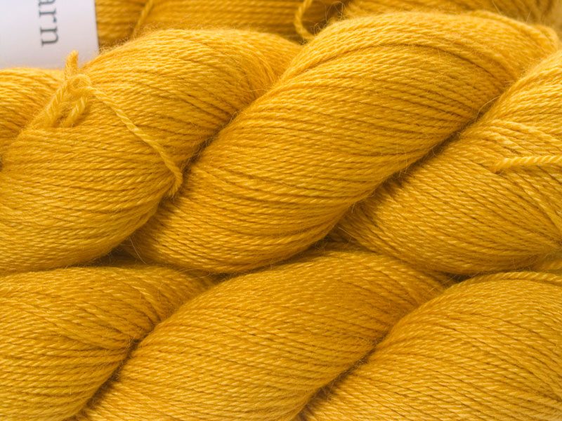 Yellow Baby Alpaca Silk & Cashmere 4-ply yarn. Hand-dyed by Triskelion Yarn.