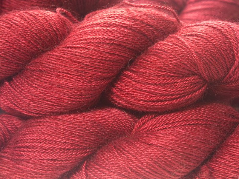 Red Baby Alpaca Silk & Cashmere 4-ply yarn. Hand-dyed by Triskelion Yarn.