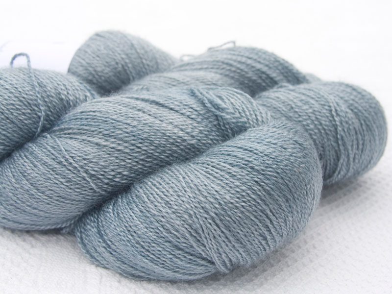 Grey Bluefaced Leicester laceweight yarn. Hand-dyed by Triskelion Yarn.
