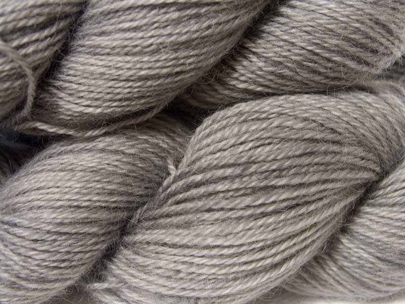 Light to mid neutral grey hand-dyed Wensleydale DK/ Double Knit yarn. Hand-dyed by Triskelion Yarn