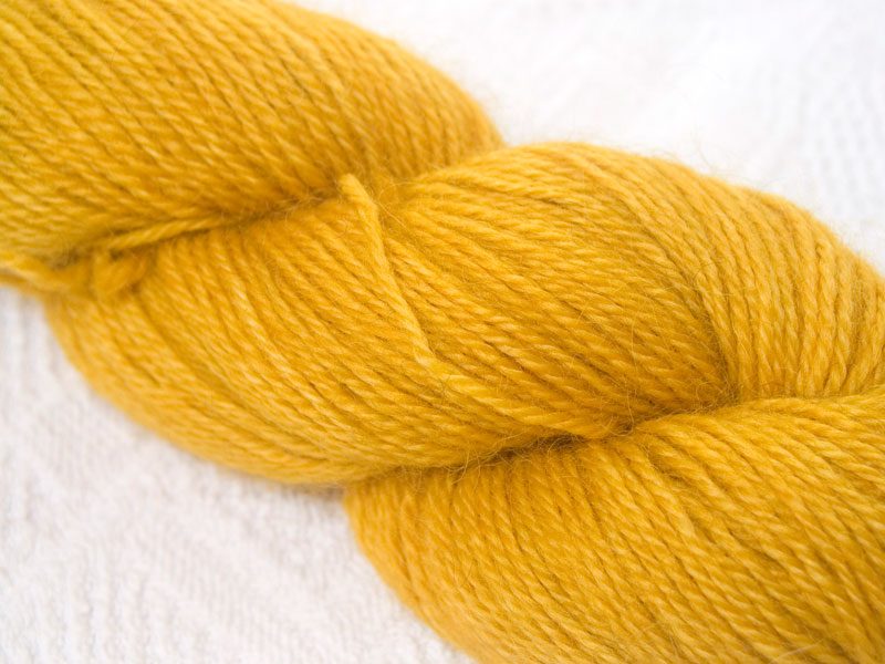 Gold hand-dyed Wensleydale DK/ Double Knit yarn. Hand-dyed by Triskelion Yarn