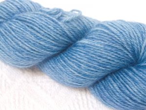 Light blue hand-dyed Wensleydale DK/ Double Knit yarn. Hand-dyed by Triskelion Yarn