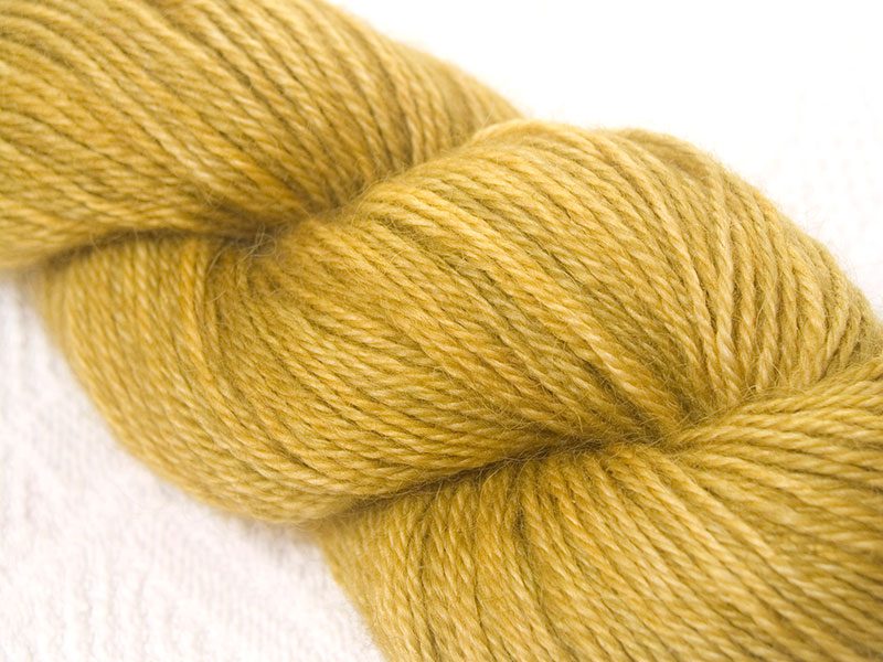 Ochre hand-dyed Wensleydale DK/ Double Knit yarn. Hand-dyed by Triskelion Yarn