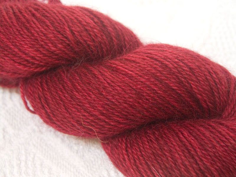 Red hand-dyed Wensleydale DK/ Double Knit yarn. Hand-dyed by Triskelion Yarn