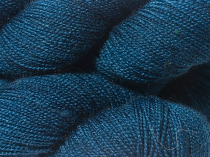 Semi-solid to solid deep royal blue superwash Bluefaced Leicester (BFL) 4-ply/fingering/sock yarn. Hand-dyed by Triskelion Yarn