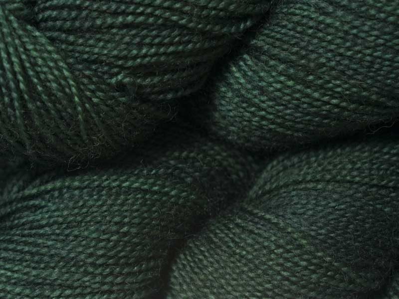 Moss green superwash Bluefaced Leicester (BFL) 4-ply/fingering/sock yarn. Hand-dyed by Triskelion Yarn