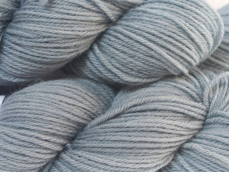 Bluish mid grey superwash British Bluefaced Leicester sportweight yarn. hand-dyed by Triskelion Yarn