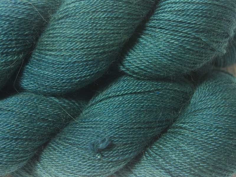 Mid to dark teal green Baby Alpaca Silk & Cashmere 4-ply yarn. Hand-dyed by Triskelion Yarn.