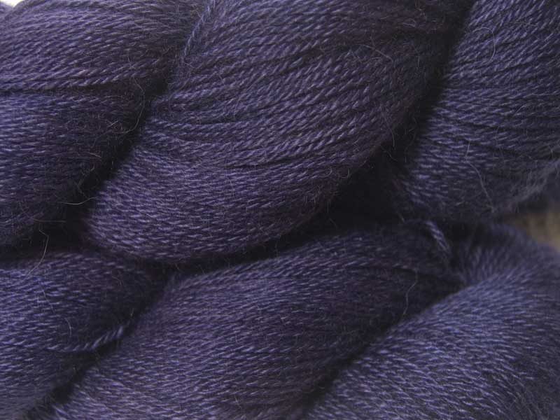 Semi-solid deep purple and blue-violet Baby Alpaca Silk & Cashmere 4-ply yarn. Hand-dyed by Triskelion Yarn.
