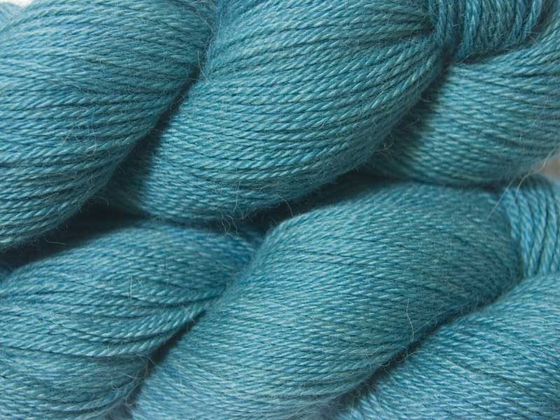 Mid-tone turquoise green Baby Alpaca Silk & Cashmere 4-ply yarn. Hand-dyed by Triskelion Yarn.