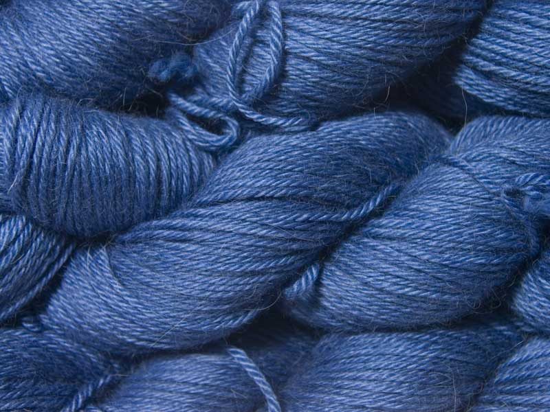 Semi-solid deep cornflower blue Baby Alpaca Silk & Cashmere double-knit yarn. Hand-dyed by Triskelion Yarn.