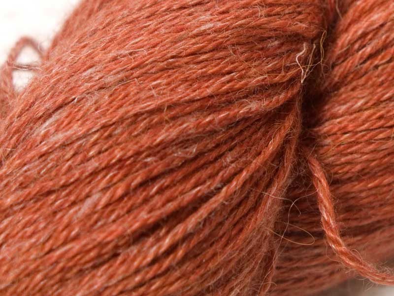 Semi-solid light fiery orange Baby Alpaca, silk and linen 4-ply yarn. Hand-dyed by Triskelion Yarn.