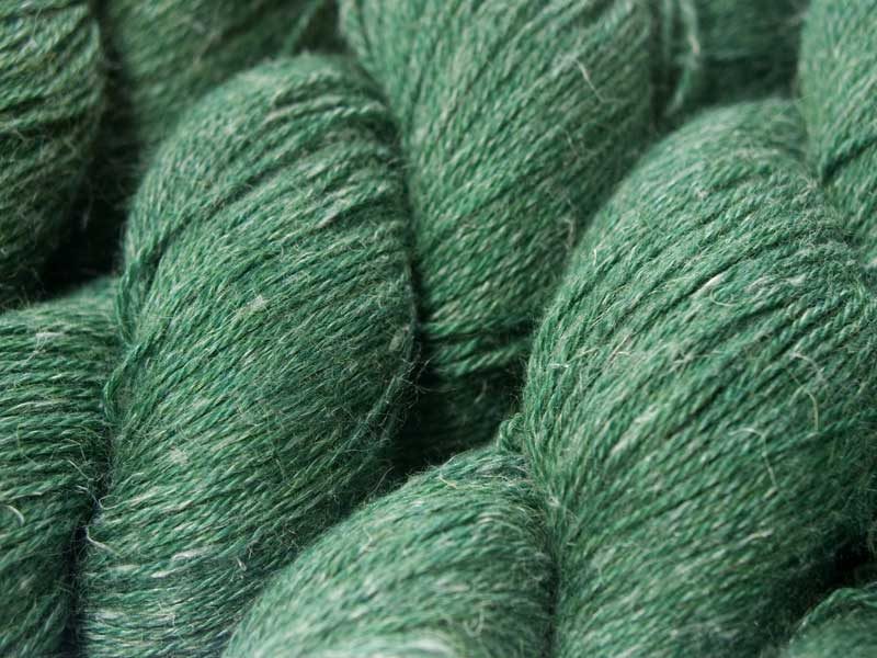 Deep forest green Baby Alpaca, silk and linen 4-ply yarn. Hand-dyed by Triskelion Yarn.