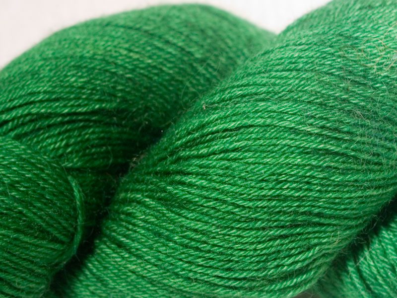 Semi-solid deep woodland green superwash Bluefaced Leicester (BFL) 4-ply/fingering/sock yarn. Hand-dyed by Triskelion Yarn