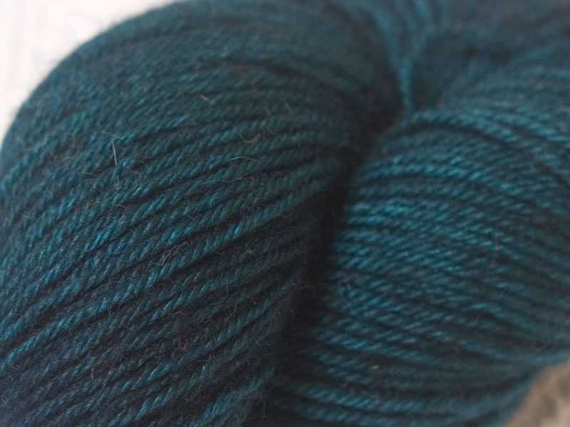 Teal superwash Bluefaced Leicester (BFL) double knit yarn. Hand-dyed by Triskelion Yarn