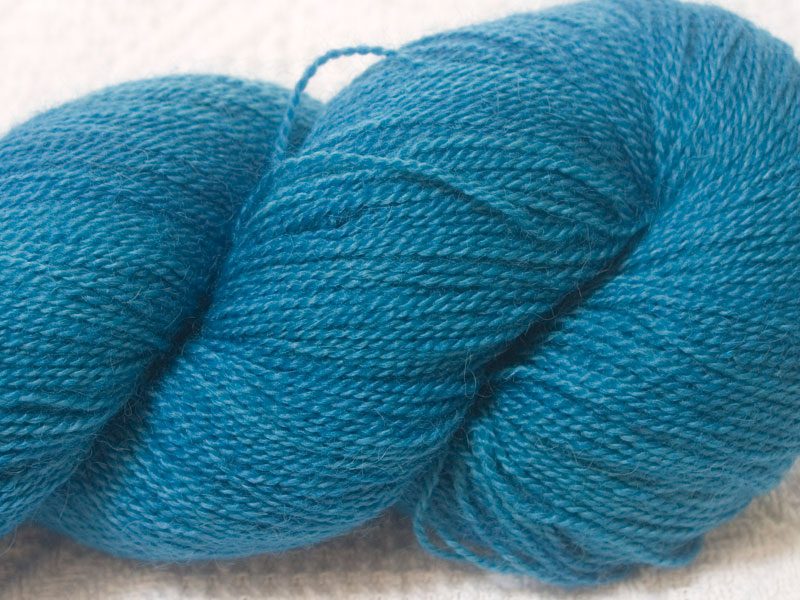 Light to mid-tone sky blue Bluefaced Leicester & baby alpaca 3-ply yarn hand-dyed by Triskelion Yarns