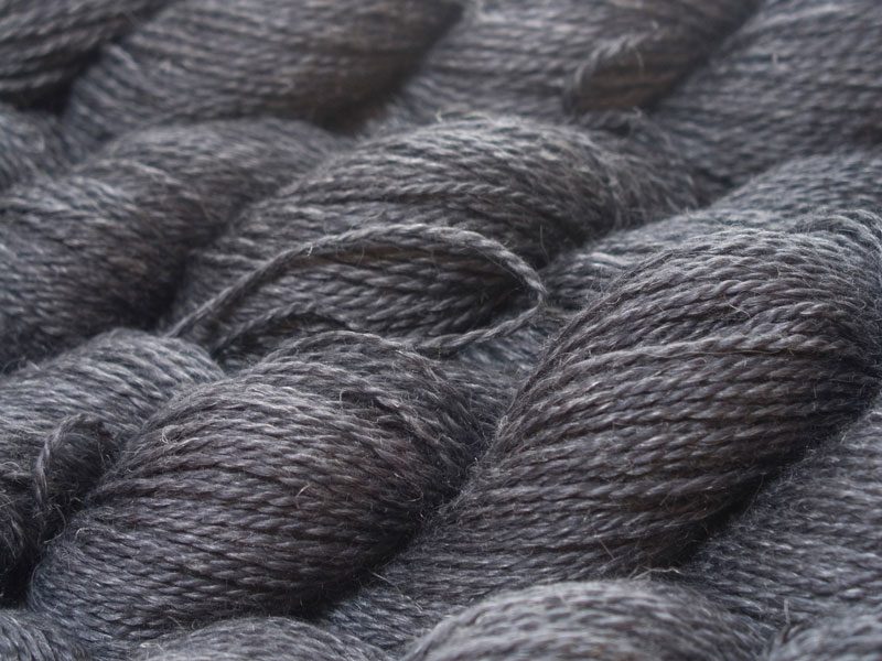 Charcoal grey Baby Alpaca, silk and linen sport weight yarn. Hand-dyed by Triskelion Yarn.