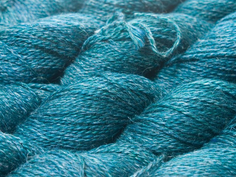 Mid to dark teal Baby Alpaca, silk and linen sport weight yarn. Hand-dyed by Triskelion Yarn.