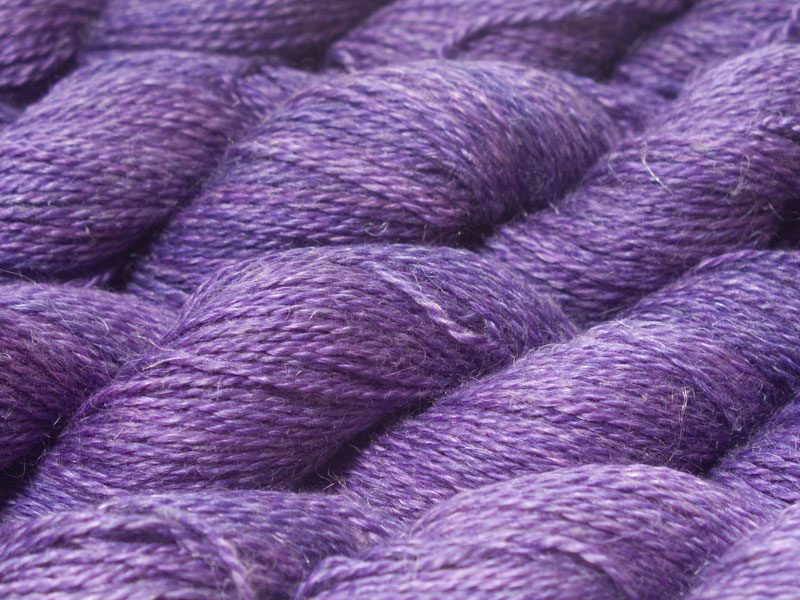 Semi-solid mid-tone purple Baby Alpaca, silk and linen sport weight yarn. Hand-dyed by Triskelion Yarn.