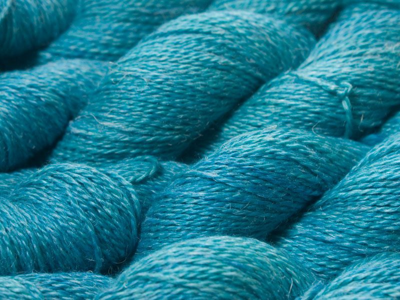 Mid-tone turquoise green Baby Alpaca, silk and linen sport weight yarn. Hand-dyed by Triskelion Yarn.