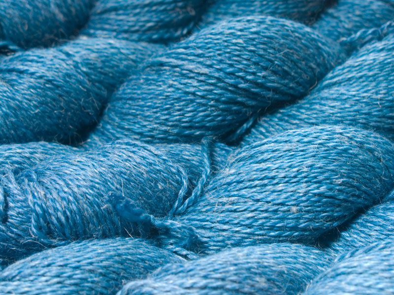 Semi-solid cerulean blue Baby Alpaca, silk and linen sport weight yarn. Hand-dyed by Triskelion Yarn.