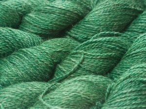Deep forest green Baby Alpaca, silk and linen sport weight yarn. Hand-dyed by Triskelion Yarn.