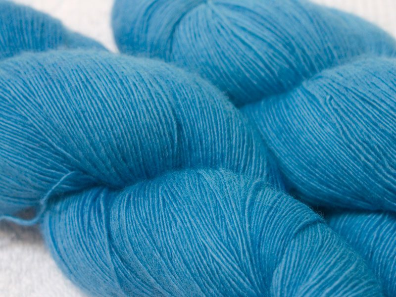 Light to mid-tone sky blue Falklands Merino laceweight yarn hand-dyed by Triskelion Yarns