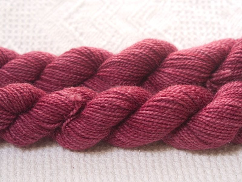 Cassiopeia - Rich mid-tone rose superwash Bluefaced Leicester (BFL) 4-ply/fingering/sock yarn mini skein. Hand-dyed by Triskelion Yarn